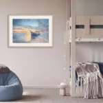 "Morning Solitude" framed ocean painting in a child’s bedroom, adding a calming and dreamy nautical touch.