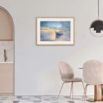"Morning Solitude" watercolor painting framed in a pastel-colored dining room, enhancing its soft, airy aesthetic.
