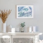 Whispering Wave watercolor painting displayed in a coastal interior, bringing calming ocean vibes and tranquil ambiance to the room.