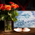 Whispering Wave watercolor painting in a coastal-inspired studio interior, complemented by delicate flowers, evoking a serene and refreshing ocean ambiance.