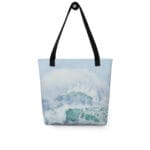 Turquoise ocean wave tote bag with a watercolor print of rolling waves and white sea foam, inspired by the beauty and tranquility of the sea.