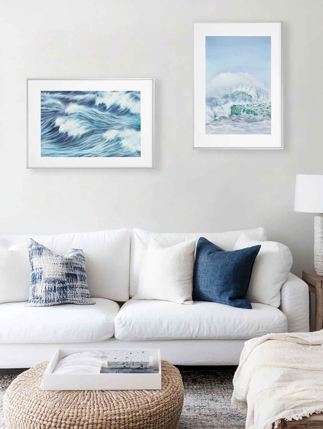 Blue Ocean Whisper watercolor print above sofa in coastal-style living room, abstract ocean wave painting for serene beach-inspired decor.