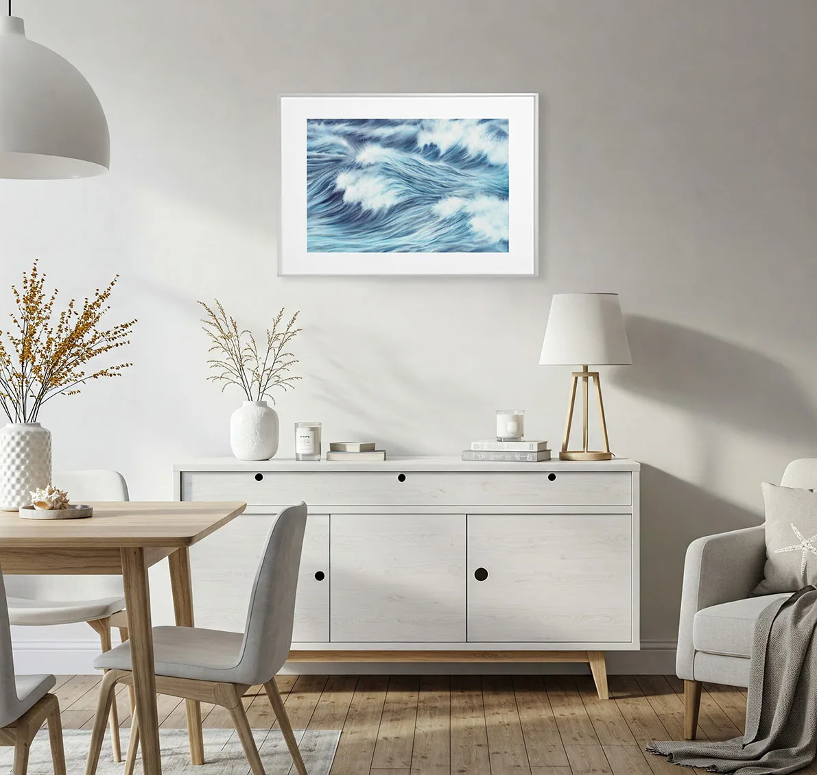 Coastal dining room with framed Blue Ocean Whisper fine art print, ocean wave watercolor painting perfect for serene seaside-inspired meals.