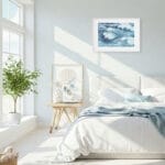 Bright bedroom with ocean wave print Blue Ocean Whisper, abstract blue seascape enhancing beach-style interiors with relaxing energy.