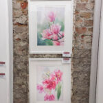 Dancing Tulips framed and displayed at an art exhibition, featuring its fluid brushwork and elegant floral composition.