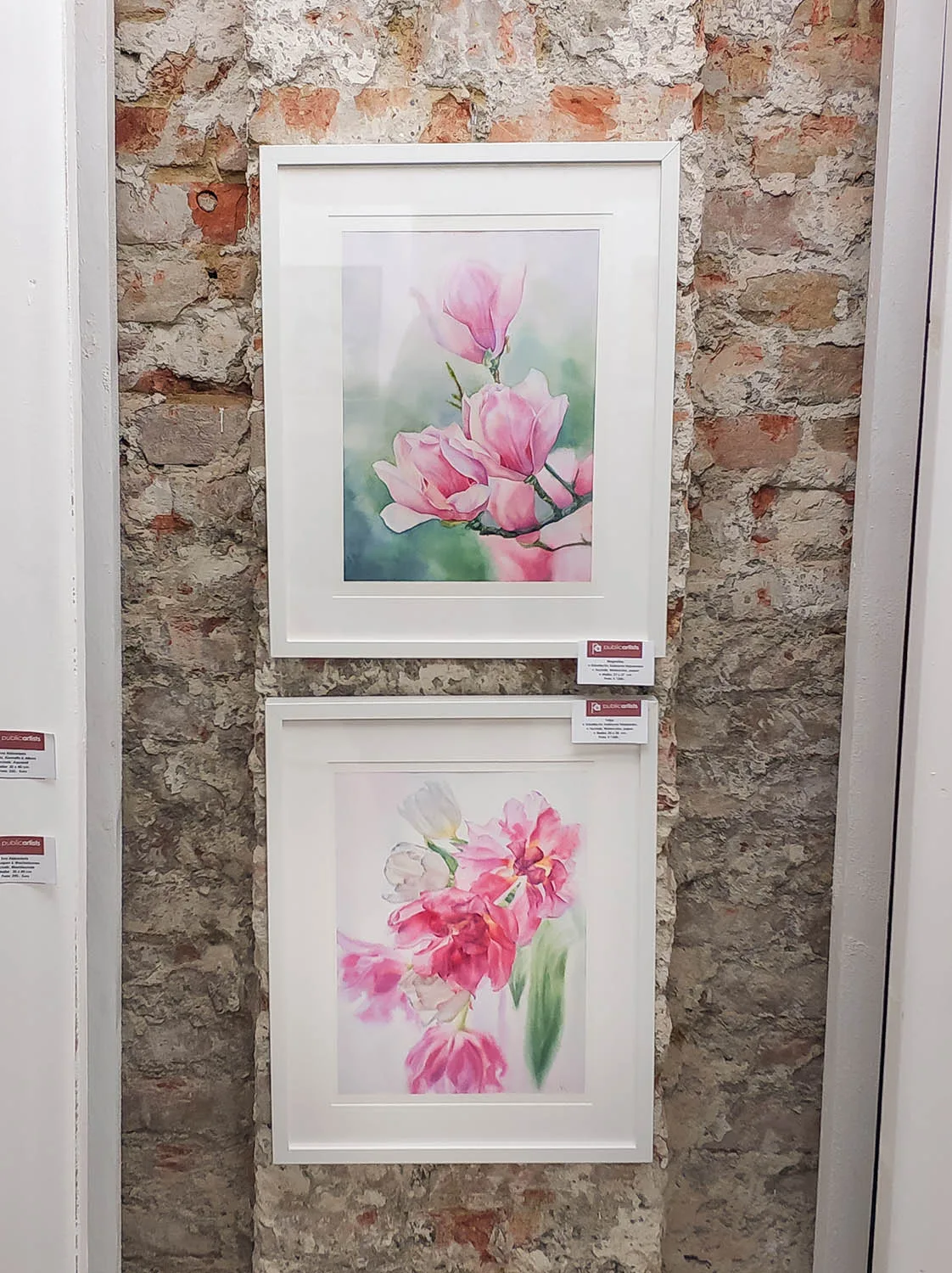 Dancing Tulips framed and displayed at an art exhibition, featuring its fluid brushwork and elegant floral composition.