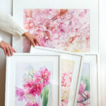 Dancing Tulips framed and placed in the artist’s studio, surrounded by art and natural light.