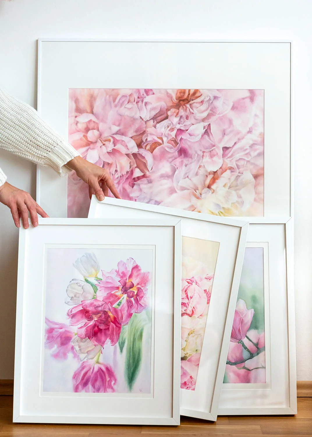 Dancing Tulips framed and placed in the artist’s studio, surrounded by art and natural light.