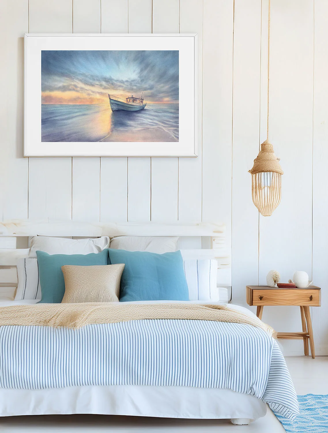 Watercolor seascape print Morning Solitude featuring a calm sea at sunrise with a boat, styled in a light coastal bedroom with ocean-inspired wall art and soft natural tones.