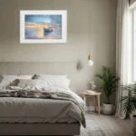 Modern bedroom interior featuring Morning Solitude seascape print, a calming watercolor painting of ocean, boat, and sunrise, perfect for minimalist nature-themed decor.