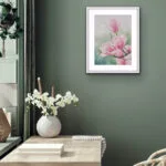 Pink Magnolias watercolor painting adding a fresh and romantic floral accent to a stylish living space.
