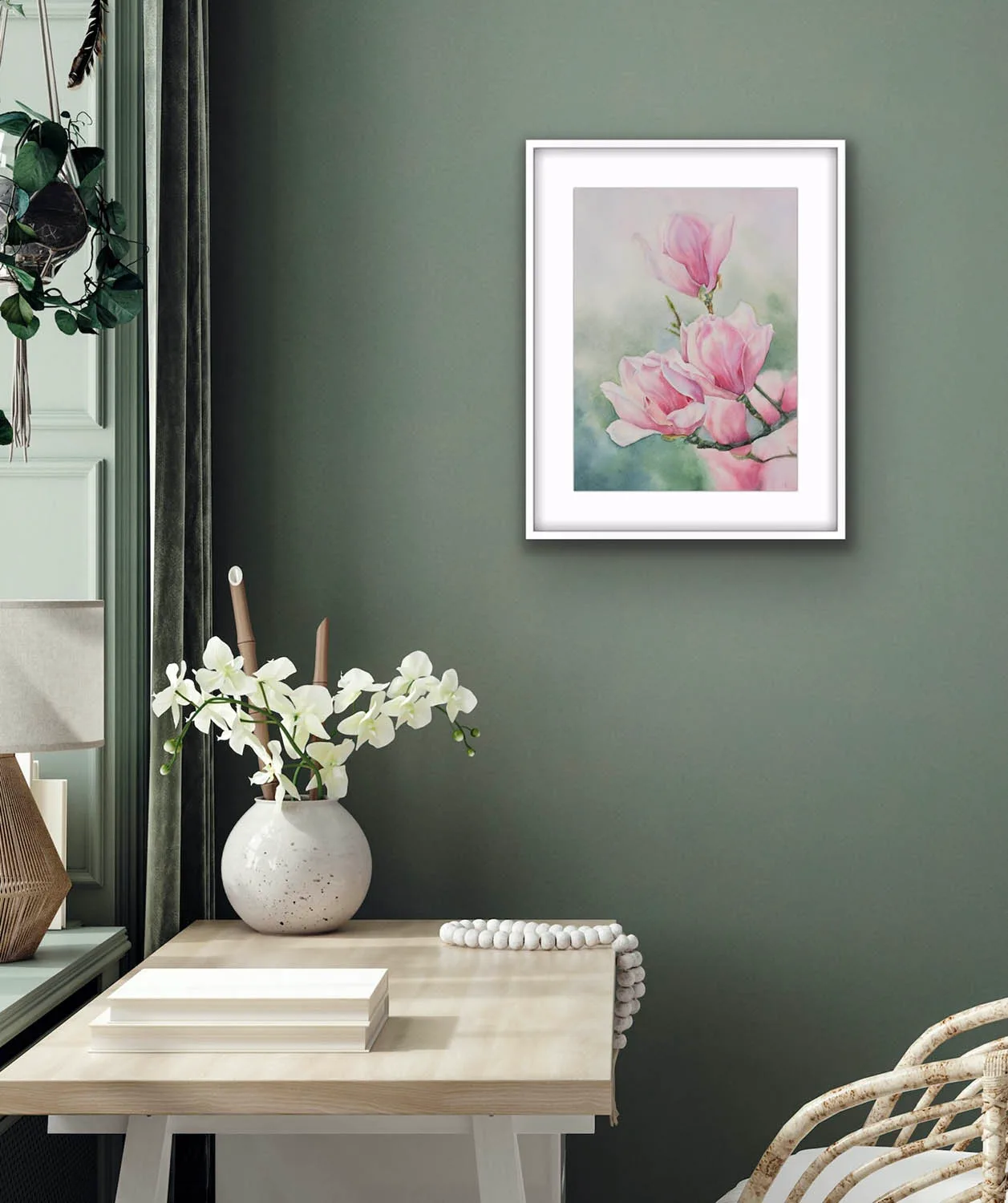 Pink Magnolias watercolor painting adding a fresh and romantic floral accent to a stylish living space.