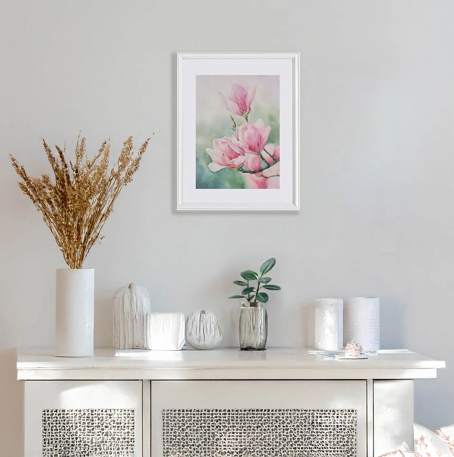 Pink Magnolias floral painting displayed in a modern living room, complementing neutral tones with its soft, pastel hues.