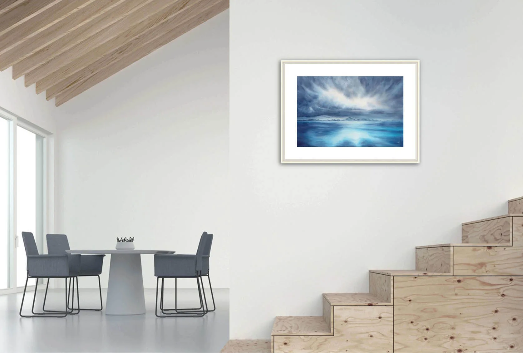 "Where Storm Meets Light" fine art print of a stormy sea watercolor painting displayed along the stairs. This blue ocean wall art adds a striking marine-inspired touch to the staircase area, bringing a dramatic and serene seascape focal point that enhances the flow of the home’s interior.