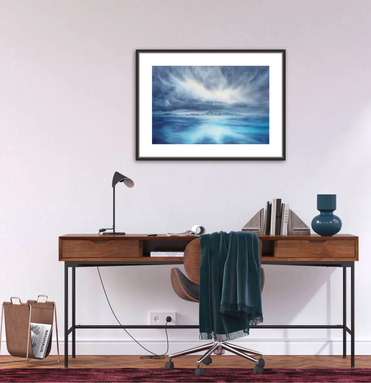 "Where Storm Meets Light" fine art print of a stormy sea watercolor painting displayed in a home office. This blue ocean wall art adds a calming, yet dramatic touch to the workspace, enhancing the modern, coastal-inspired decor with a peaceful seascape focal point.