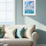 Ocean-themed watercolor painting in white and blue living room, summer sailboat wall decor