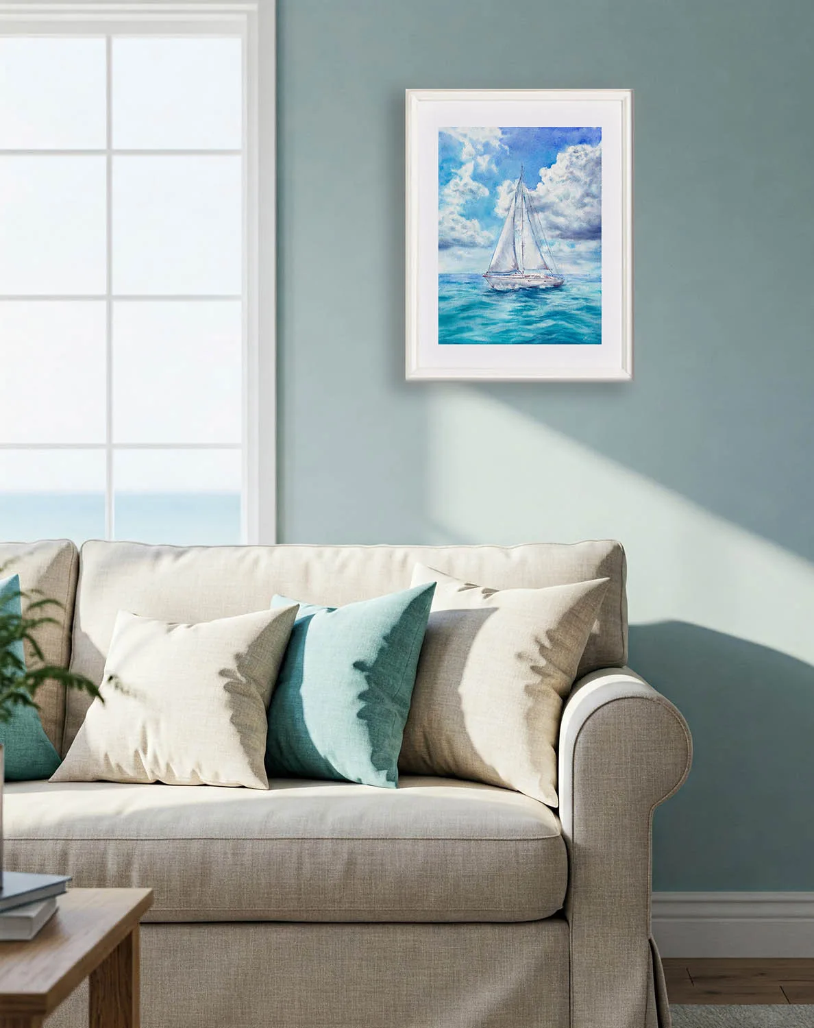 Ocean-themed watercolor painting in white and blue living room, summer sailboat wall decor