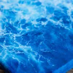 painting "Liquid Energy" – original watercolor on canvas depicting abstract ocean water in blue tones