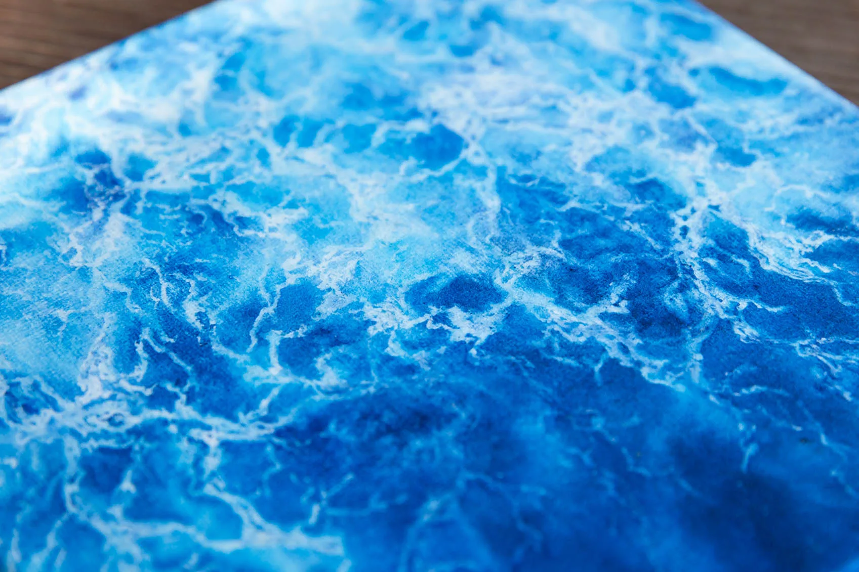 Blue abstract ocean watercolor painting "Liquid Energy" by Kateryna Nazarenko, original artwork on canvas with flowing sea waves and coastal energy.