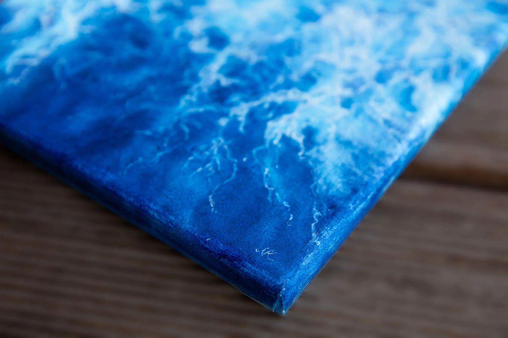 Signature of Kateryna Nazarenko on "Liquid Energy" abstract blue ocean watercolor painting on canvas, original fine art inspired by sea movement.