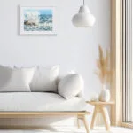 Fine art print Stormy Tide Rush displayed in a modern coastal living room above sofa
