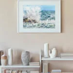 Stormy Tide Rush watercolor ocean print decorating a modern living room with neutral tones and marine accents