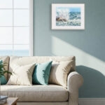 Stormy Tide Rush fine art print in a bright coastal living room above the sofa with sea-inspired interior design
