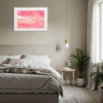 "Pink Lakes of Ukraine" watercolor painting above bed in soft, coastal-style bedroom — perfect for adding a peaceful and refreshing pink landscape to your sleep space.