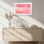 "Pink Lakes of Ukraine" watercolor painting styled in a bright modern living room, adding a vibrant touch of natural pink and cultural heritage to home decor — original Ukrainian art.