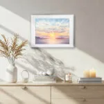 Original seascape watercolor of Saint-Jacut-de-la-Mer shoreline under pastel evening clouds and glowing horizon