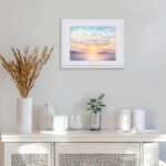 Dreamy beach sunset print with watercolor textures, soft horizon, and glowing sunlight reflections for ocean-inspired home décor