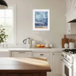 fter Dark original watercolor seascape art of Brittany ocean sunset and dark clouds styled in a modern kitchen interior, coastal painting for wall decor