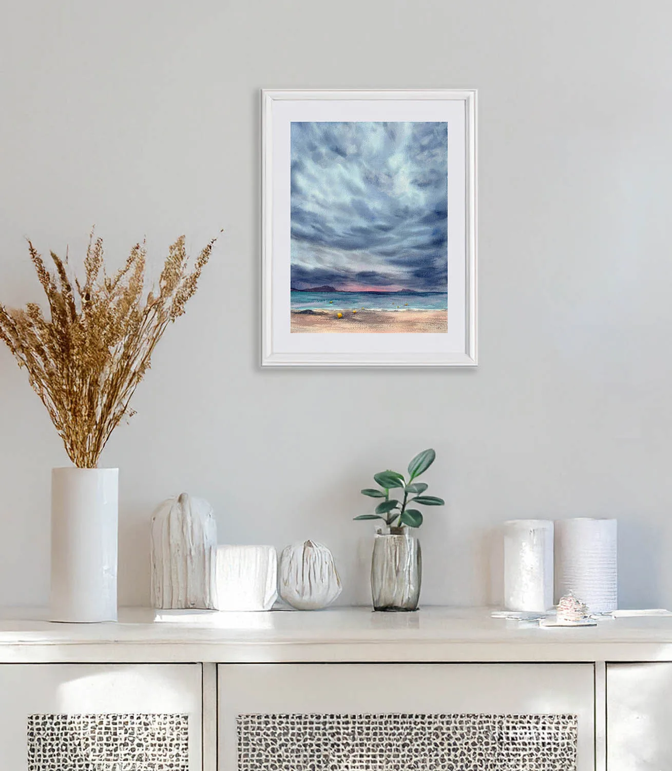 After Dark ocean watercolor artwork above the sofa in coastal living room, nautical wall art for beach house decor