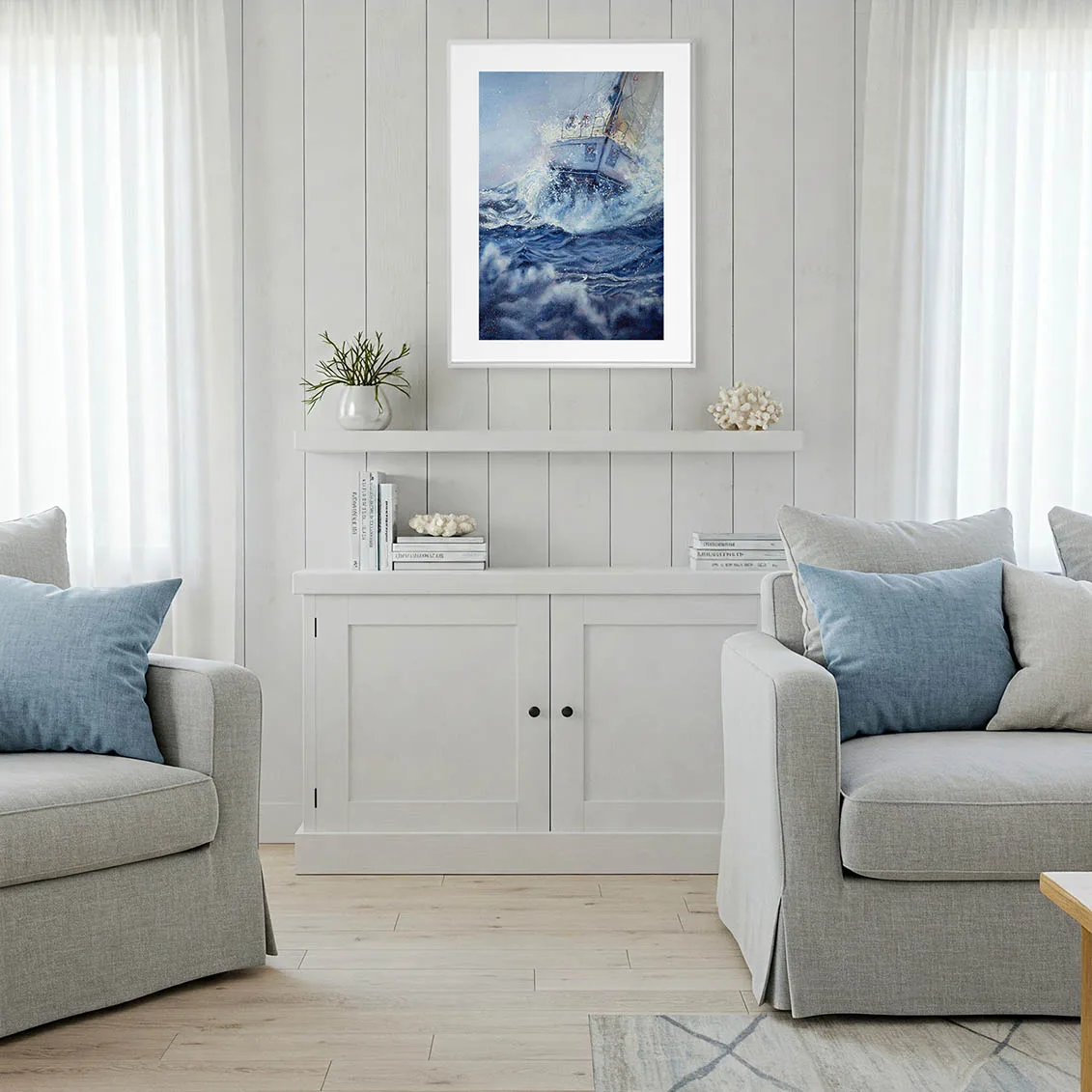 Bravery sailing boat watercolor painting framed in a coastal living room, showcasing dramatic storm waves, ocean spray, and nautical wall art that adds dynamic marine energy to the décor.
