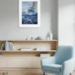 Bravery nautical watercolor painting on the living room wall, featuring powerful ocean waves, splashing water, and a courageous sailboat — perfect for ocean lovers and coastal interiors.