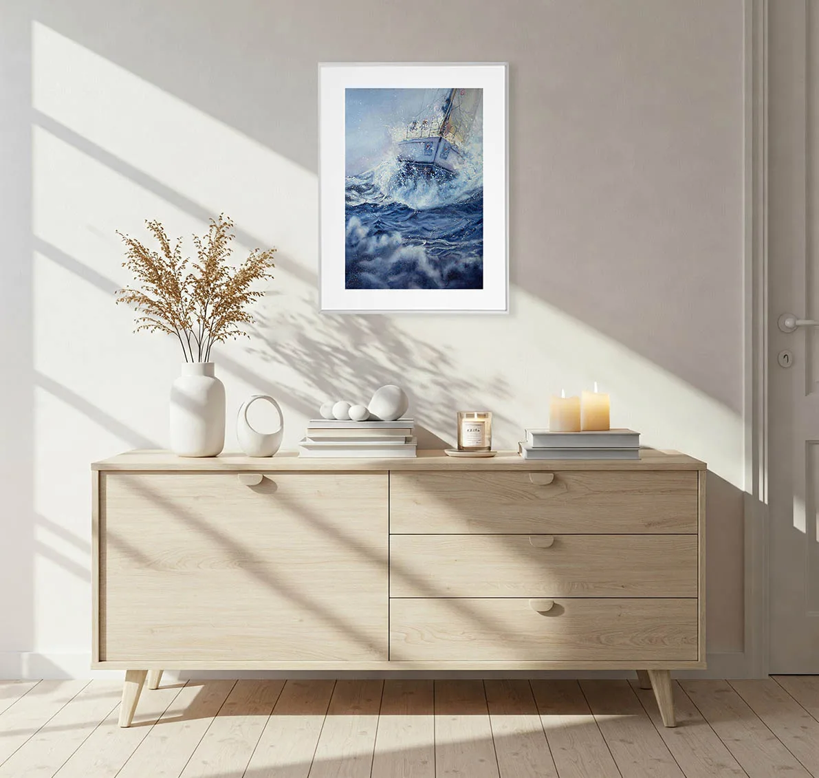Bravery stormy ocean sailing artwork in a bright coastal living room, bringing nautical elegance, dynamic sea movement, and bold marine color tones to the interior design.