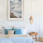 Storm Anticipation seascape watercolor framed in a bedroom, creating calming coastal décor with storm clouds and gentle ocean waves.