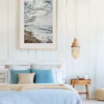 Storm Anticipation seascape watercolor framed in a bedroom, creating calming coastal décor with storm clouds and gentle ocean waves.