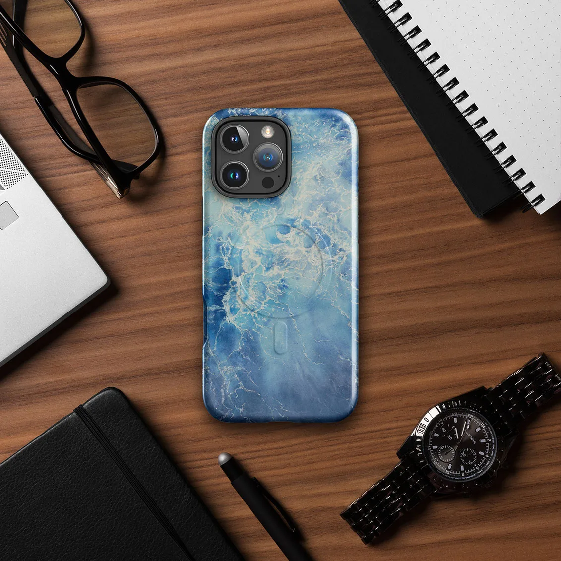 Blue Ocean watercolor iPhone case with MagSafe on a table