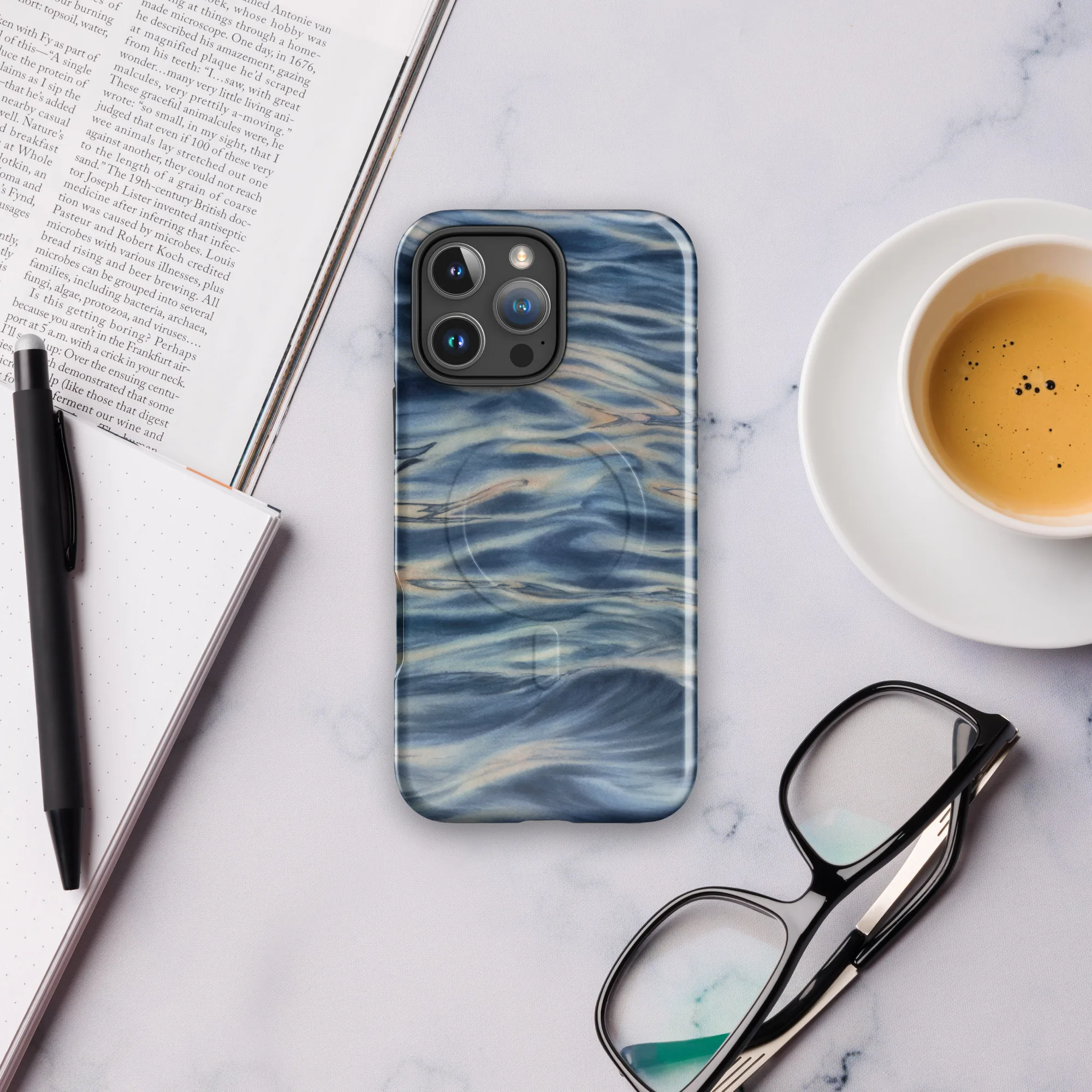 Calming blue ocean watercolor artwork printed on a MagSafe iPhone case