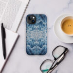 Deep blue ocean water and white sea foam artwork printed on a MagSafe iPhone case