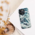 Deep blue turquoise ocean wave watercolor artwork printed on a MagSafe iPhone case