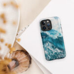 Turquoise ocean wave watercolor artwork printed on a MagSafe iPhone case