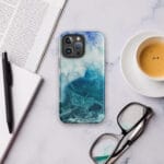 Large blue wave watercolor artwork printed on a MagSafe iPhone case