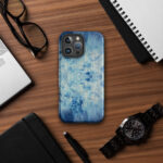 Light blue ocean watercolor iPhone case with MagSafe on table